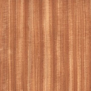 Close-up of a wooden surface showing vertical grain lines in warm reddish-brown tones, like finished wood paneling.